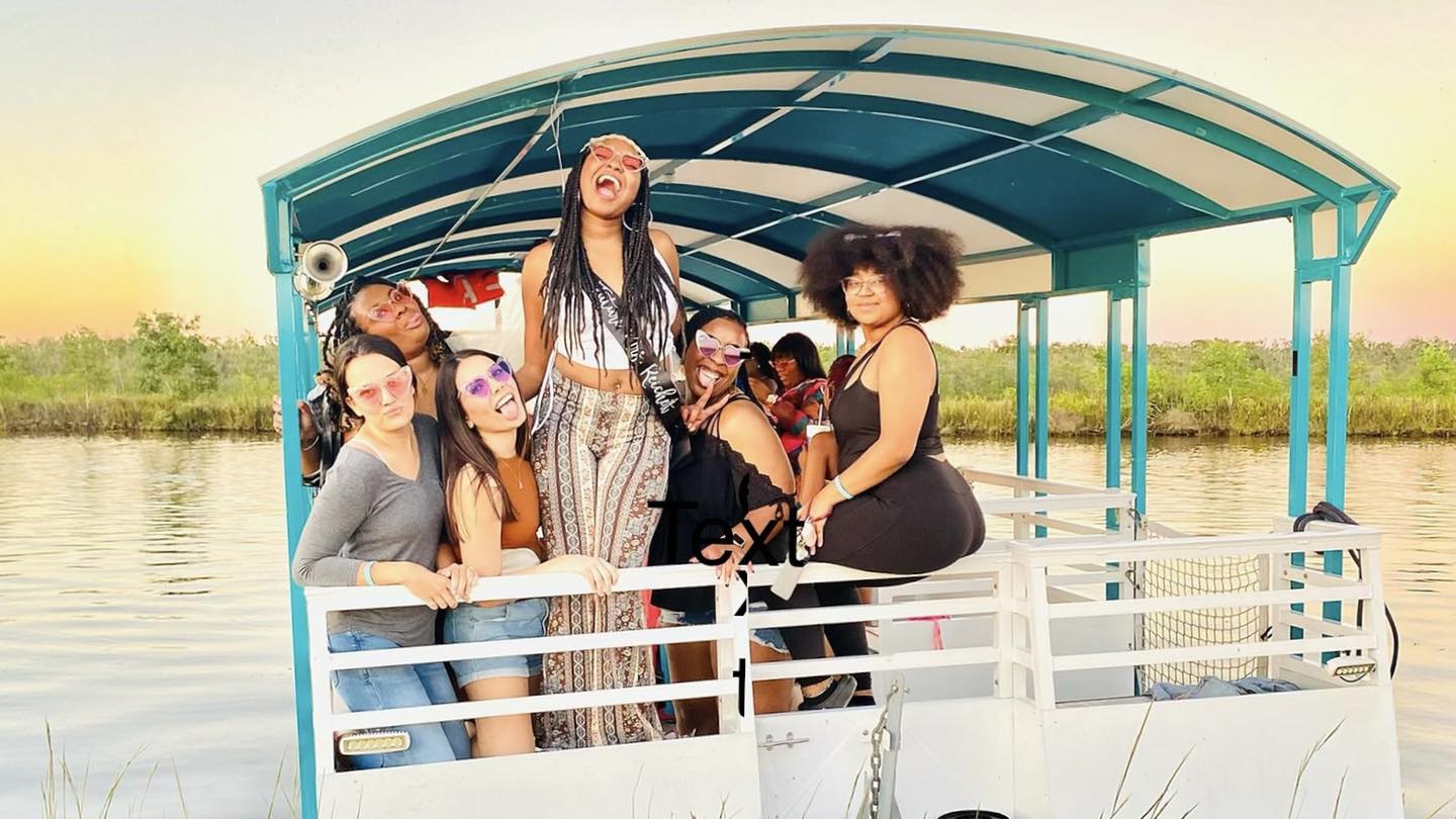 312227301_1020929988723915_7985469788516659107_n a woman standing in front of a boat